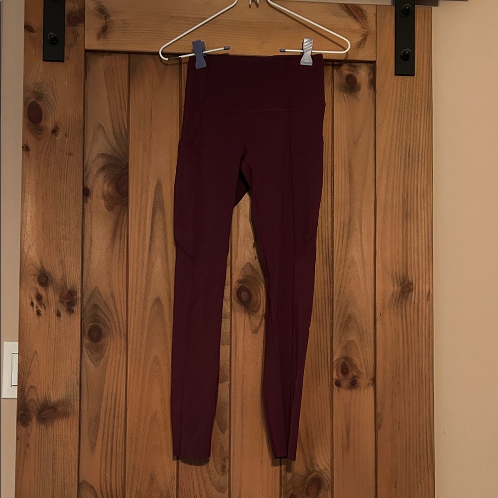 Burgundy Lululemon crop Leggings with side and back pockets